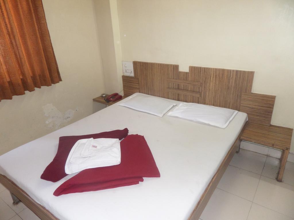 Hotel Sai Ratna Nášik Pokoj fotografie